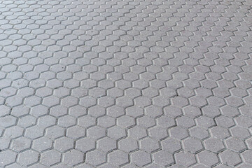 abstract background of hexagonal concrete tile in a park