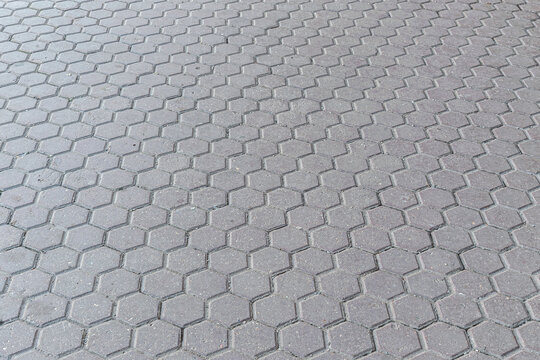 abstract background of hexagonal concrete tile in a park