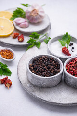 Different Asian spices in small bowls
