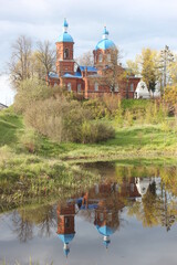 Church reflection in water
