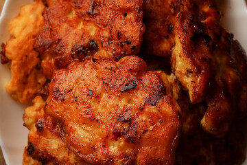 Homemade chicken cutlets. The plate is full of delicious chicken meatballs prepared for food. Fried...