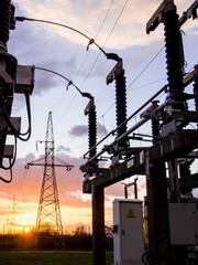 High voltage transmission system in the sunset sky