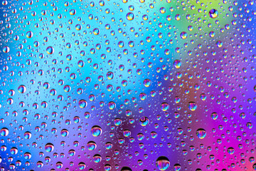 Water drops texture background. Rain on window glass. Wet rain pattern.
