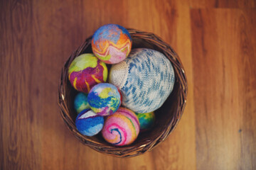 Basket with colored wool balls, Waldorf pedagogy.