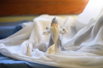 Christmas; celebration; magician; king; Wise Man; baryta; crown, wool doll.