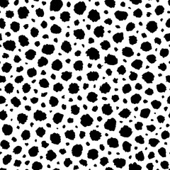 Background polka dot. Dalmation or leopard print. Seamless pattern dot. Random dots. Animal skin. Scattering dots for design fabric, wallpaper, prints. Scattered polkadots. Irregular circles. Vector