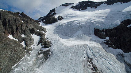 Obraz premium Aerial view of Vinciguerra Glacier in Ushuaia, Tierra del Fuego, Patagonia Argentina. Glacier ice and snow in the mountain peak.