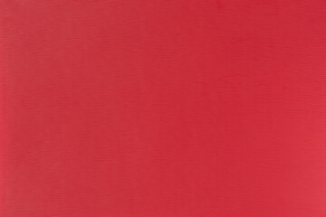 Texture of red polystyrene plastic close up, background, design with copy space