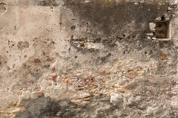 A weathered historic wall surrounding the ancient fort of Saint Florent