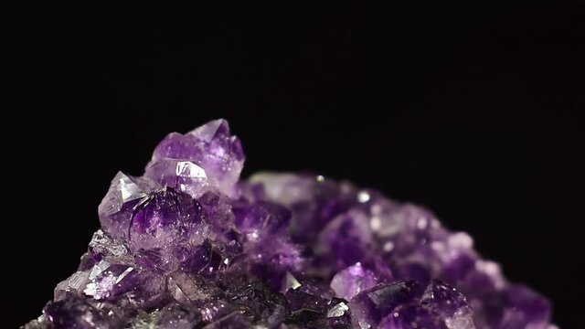 Amethyst is a beautiful colored gemstone. naturally	