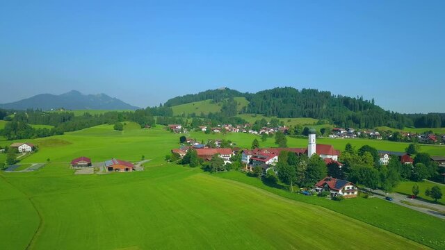 AERIAL WS Landscape with Pilgrimage Church of Maria Hilf and village / Speiden near Eisenberg, Allgaeu, Upper Bavaria, Germany