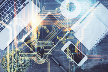 Double exposure of map hologram drawing over desktop. Top view. International connection concept.