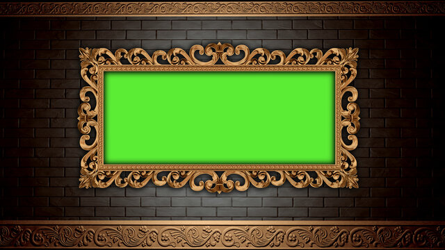 Golden vintage frame on brick wall. Design retro element. Green screen