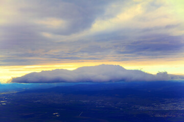 Fototapeta na wymiar big cloud over the city in the twilight