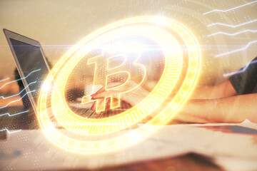 Double exposure of woman hands typing on computer and crypto market theme hologram drawing....