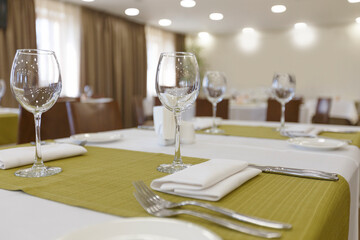 Table in restaurant ready to receive guests