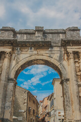 Ancient Roman triumphal arch or Golden Gate in Pula, Croatia