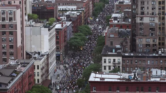 Black Lives Matter Protest In New York City. A Large Group Of People March For Social Justice And Systemic Racism Defund The Police And Racial Inequality.