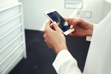 Female is searching something in web via her cell telephone
