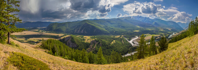 Fototapeta na wymiar Above the mountain valley, the river flows among the mountains, Altai