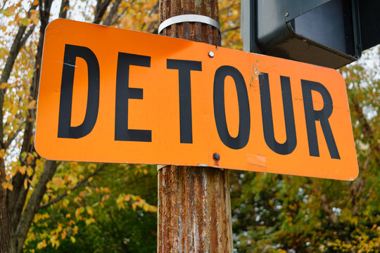 Detour traffic sign informing motorists that they'll have to use an alternate route