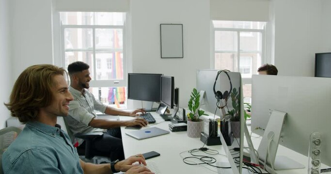 MS Business people working in office / Soho, London, England, United Kingdom