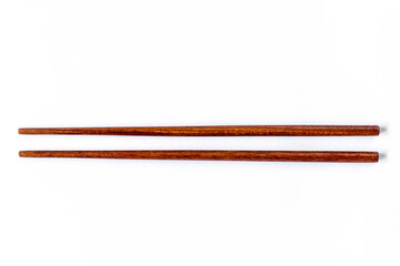 Top view wooden chopsticks on white background