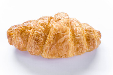 Fresh croissant on white background