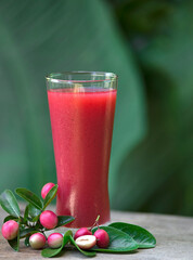 The red juice of ancient Thailand name carunda or karonda (Carissa Carandas L.), Thai herb juice.