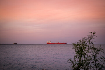 Naklejka premium sunset over the river