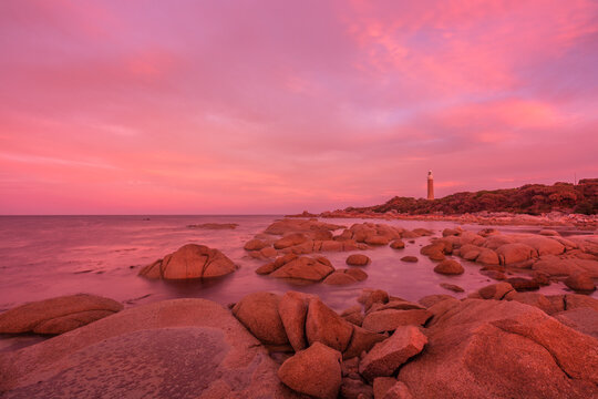 Colourful ,autumn, sunset over Eddystone Point Lighthouse.Mount William National Park.Part of The Bay of Fires Conservation Area.North East Coast of Tasmania,Australia.