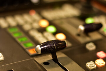 Closeup Analog sound mixer with selected focus. Professional audio mixing console broadcasting.