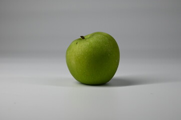 Green apple on white background