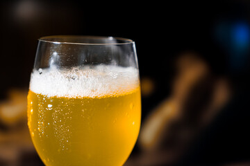 Beer glass on the bar counter.
