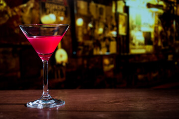 Closeup glass of Manhattan cocktail isolated decorated