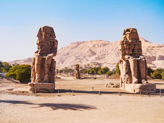 Foto op Plexiglas Ruined androsphinx statues near Hatshepsut temple, long view. High mountain on horizon. Photographed in Dayr al Bahri, Luxor. Selective soft focus. Blurred background © eriksvoboda