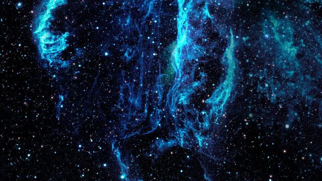 Flying into the Veil Nebula in Outer Space, also known as Cygnus Loop. The Veil Nebula is a cloud of heated and ionized gas and dust in the constellation Cygnus. 