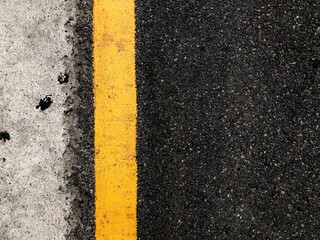 asphalt road with yellow lines - Powered by Adobe