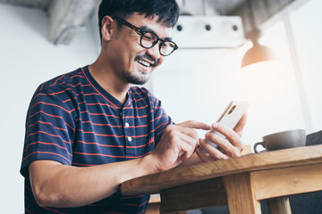 man using cell phone.hand man holding texting message on screen mobile chatting,search internet...
