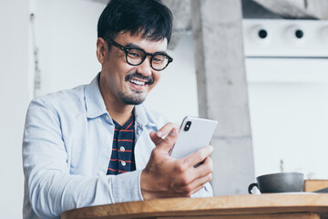 man using cell phone.hand man holding texting message on screen mobile chatting,search internet...