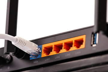 WAN port cable and LAN ports connector on the back panel of Dual Band Gigabit Wi-Fi 6 Router or...