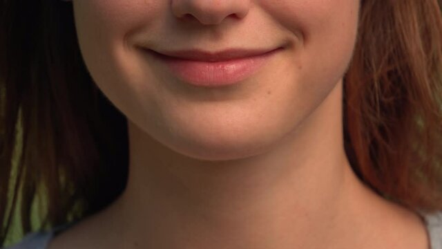 front view caucasian young woman close up lower face lips and chin