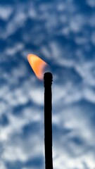 burning matches on a blue background