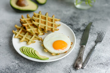 Fresh delicious and nutritious breakfast with waffles with spinach