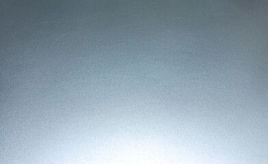 light gray textured steel metallic background with scratches, closeup view
