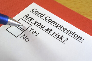 Obraz premium One person is answering question about cord compression.