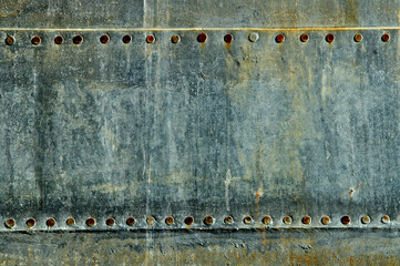 Closeup of Riveted metal panels on old water tank