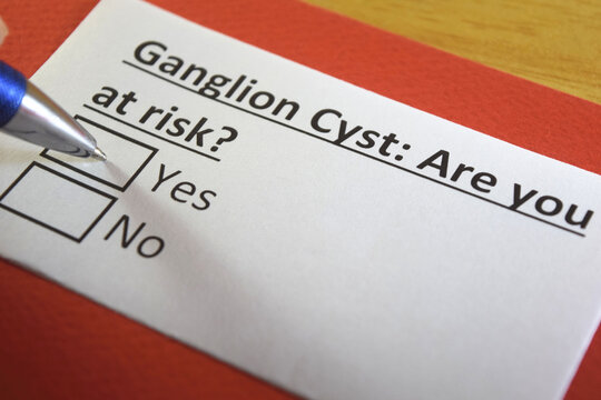 One person is answering question about ganglion cyst.