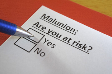 Fototapeta premium One person is answering question about malunion.