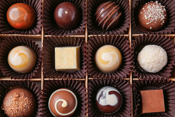 Box with delicious candies, closeup